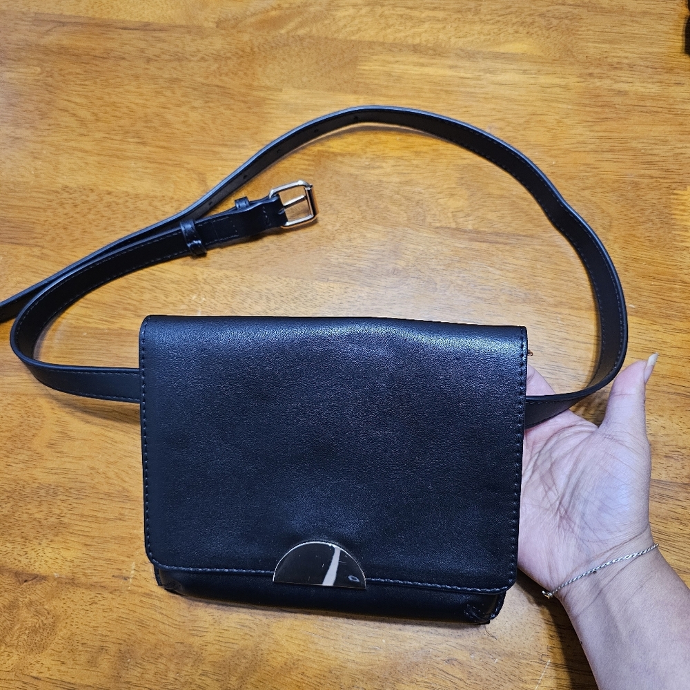 A NEW DAY faux leather fanny pack strap is 46.5 inches